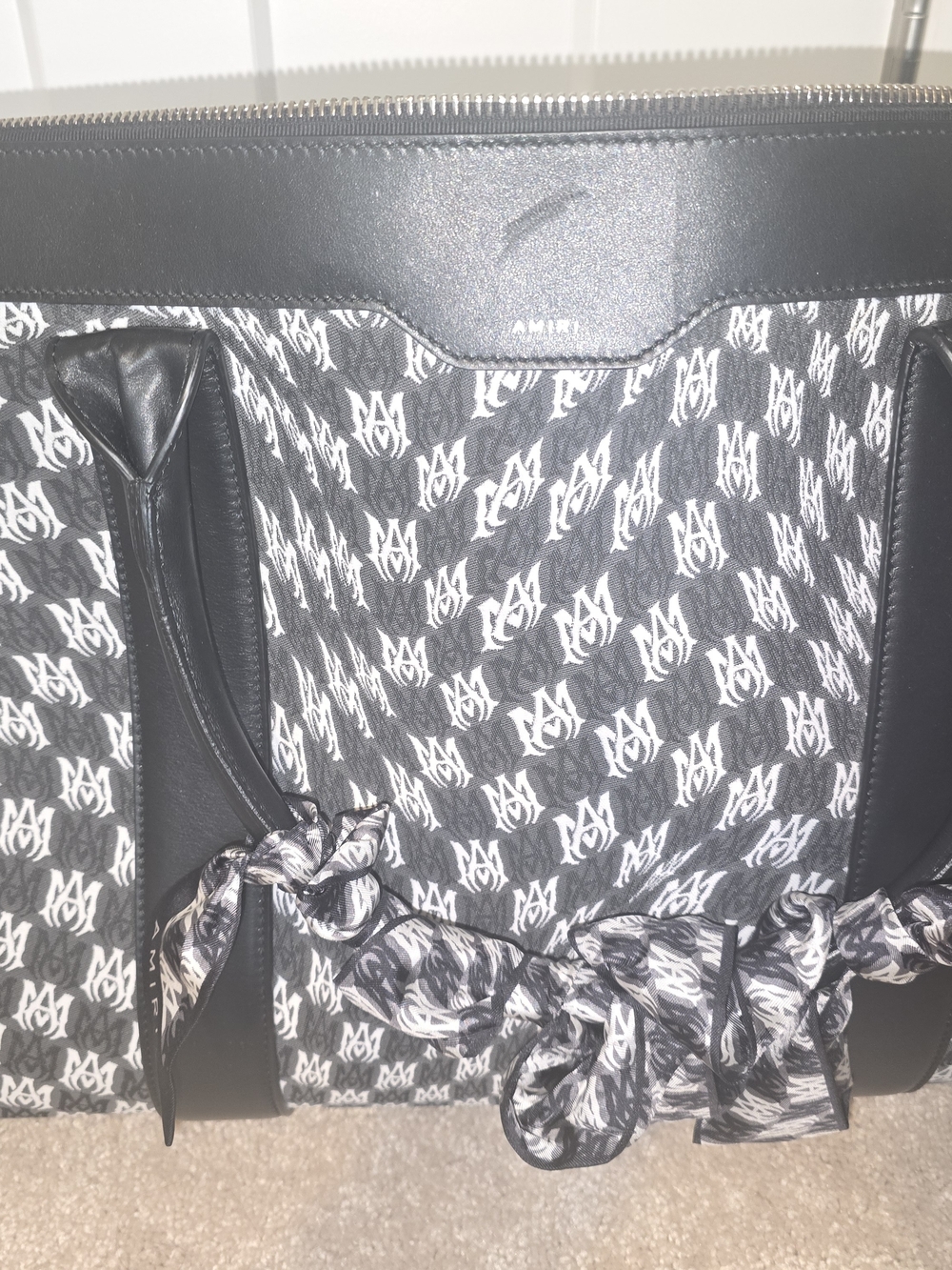 AMIRI Black & White Monogram Duffel Bag with Logo Pattern